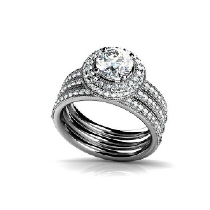 Кольцо тройное с крупным камнем в обрамлении мелких камней Os 2579