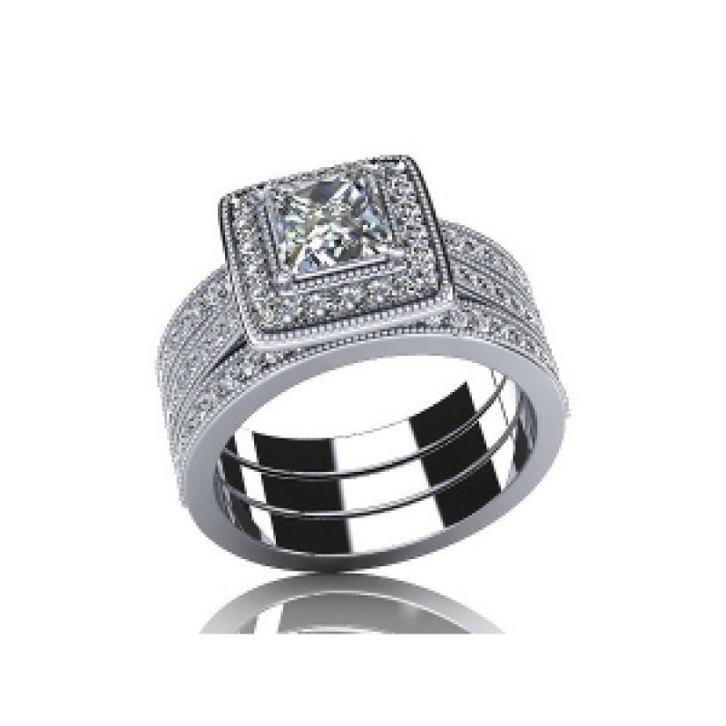 Кольцо тройное с крупным камнем в обрамлении мелких камней Os 2638