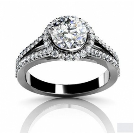 Кольцо с крупным камнем в обрамлении мелких камней Os 2550