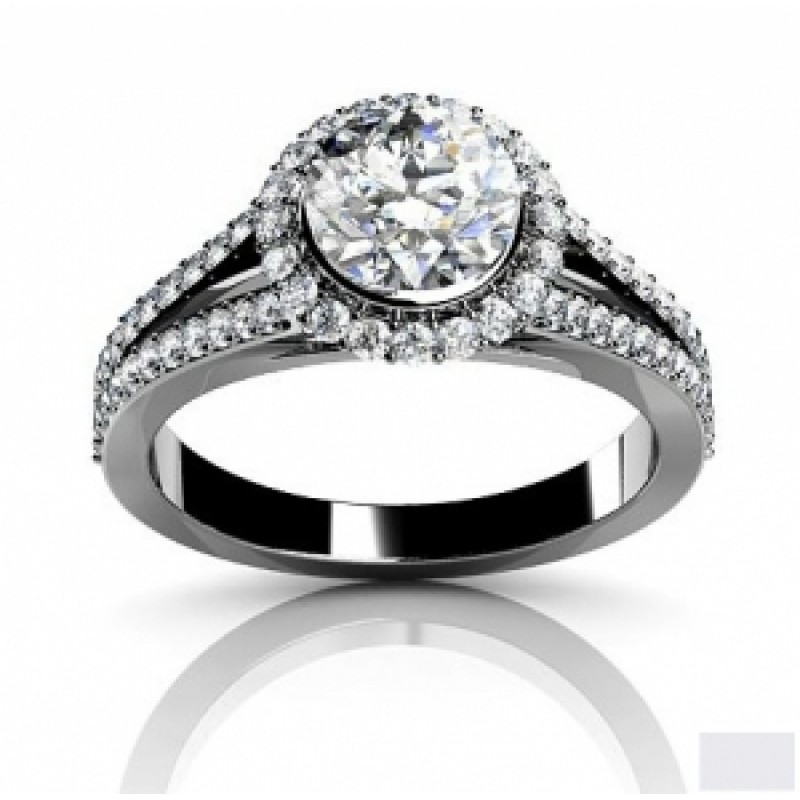 Кольцо с крупным камнем в обрамлении мелких камней Os 2550