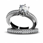 Кольцо двойное с крупным камнем и дорожками камней Os 2556