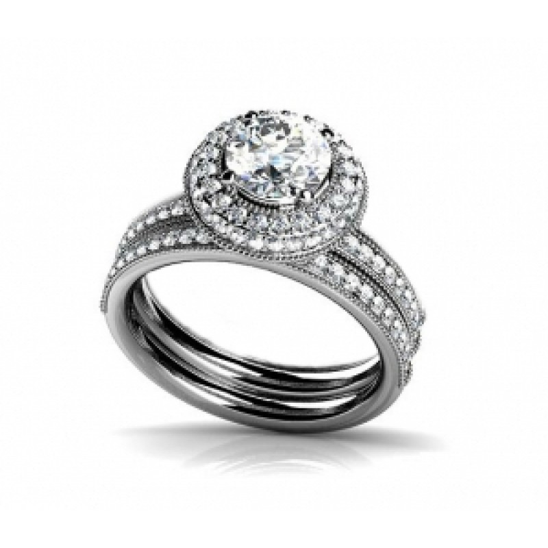 Кольцо двойное с крупным камнем в обрамлении мелких камней Os 2657