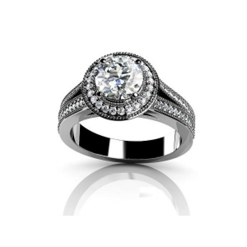 Кольцо с крупным камнем в обрамлении мелких камней Os 2562