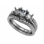 Кольцо с крупным камнем и дорожками камней Os 2523