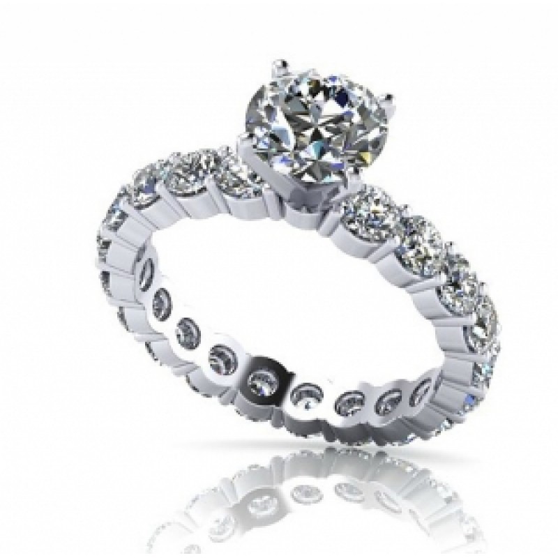 Кольцо с крупным камнем и дорожкой камней по кругу Os 2554