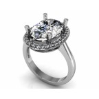 Кольцо с крупным камнем в обрамлении мелких камней Os 7185